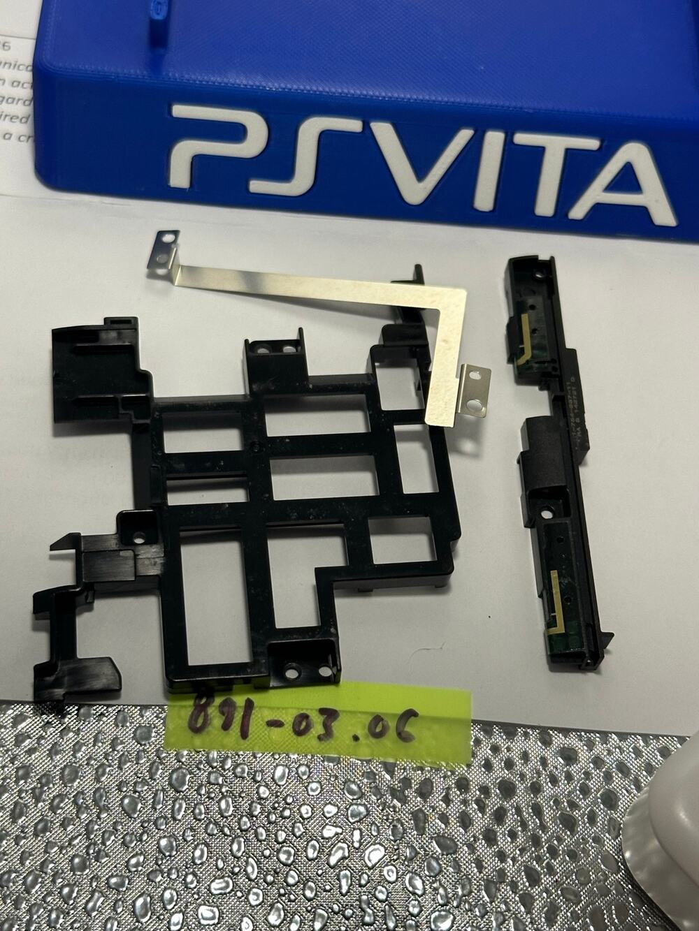 OEM ps vita 2000  Internal Midframe Chassis w / Speaker Housings- pre owned